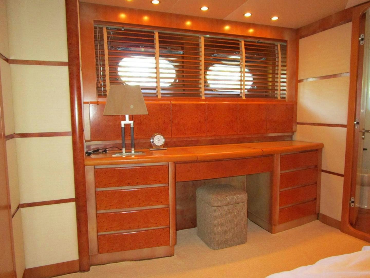 a room with a desk and a lamp aboard DEAR HENRI Yacht for Sale