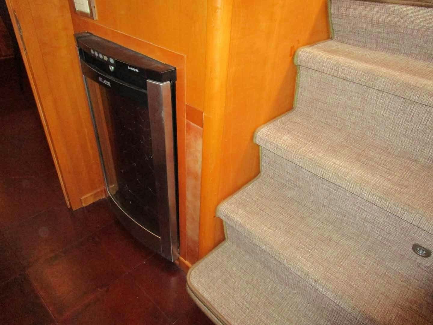 a black oven in a room aboard DEAR HENRI Yacht for Sale