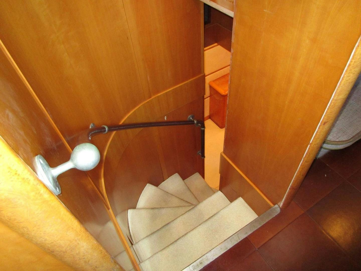 a bathroom with a wood cabinet aboard DEAR HENRI Yacht for Sale