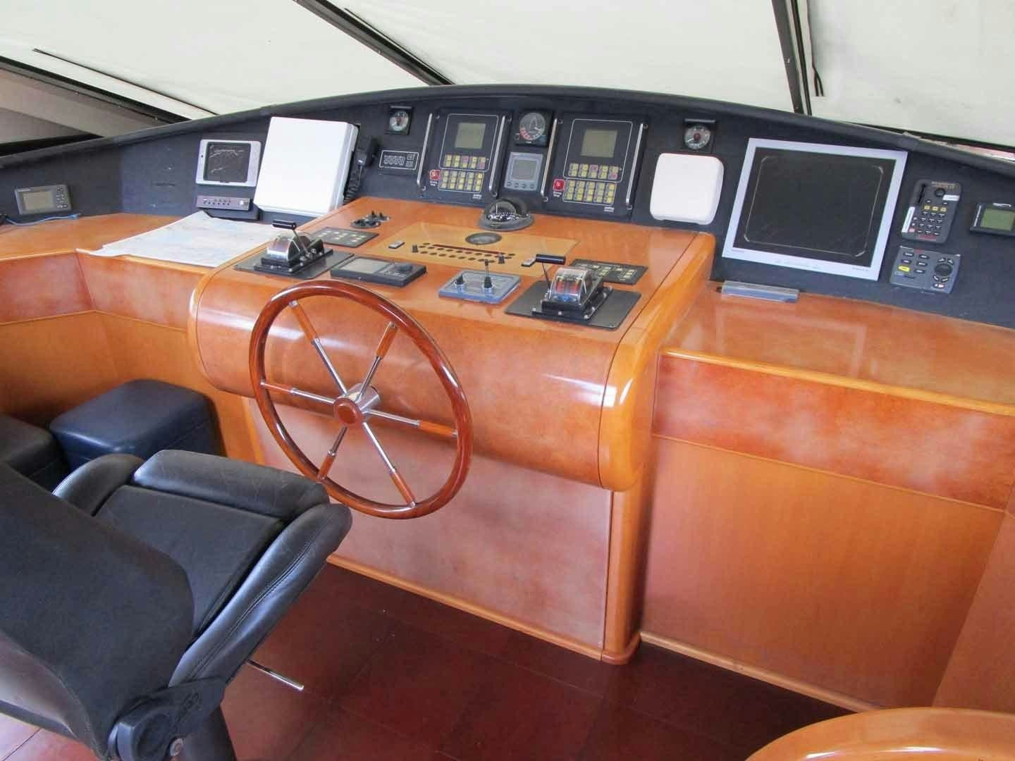 a table with electronics and electronics on it aboard DEAR HENRI Yacht for Sale
