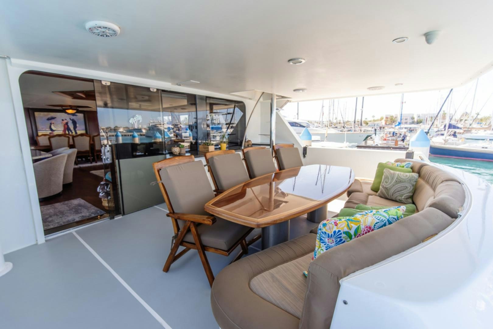 a room with a table and chairs aboard NO EXCEPTIONS Yacht for Sale