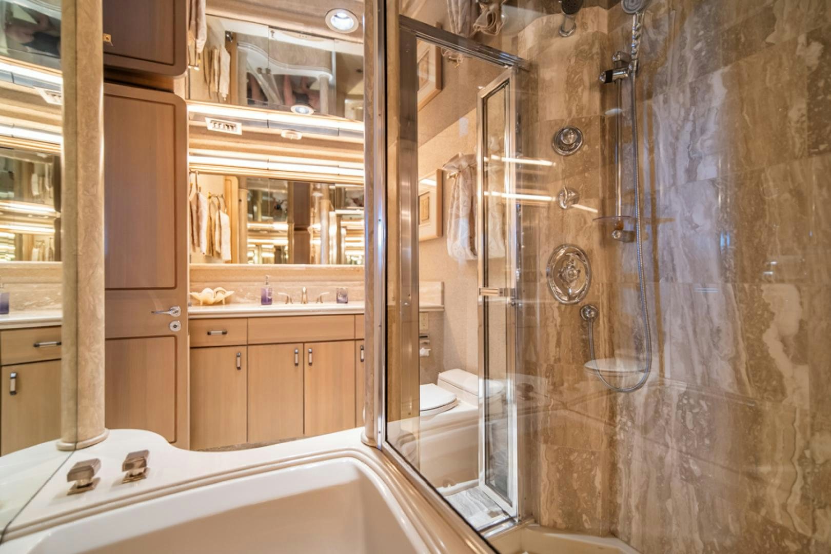 a bathroom with a shower and sink aboard NO EXCEPTIONS Yacht for Sale