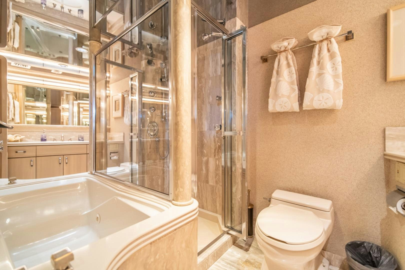 a bathroom with a shower and toilet aboard NO EXCEPTIONS Yacht for Sale