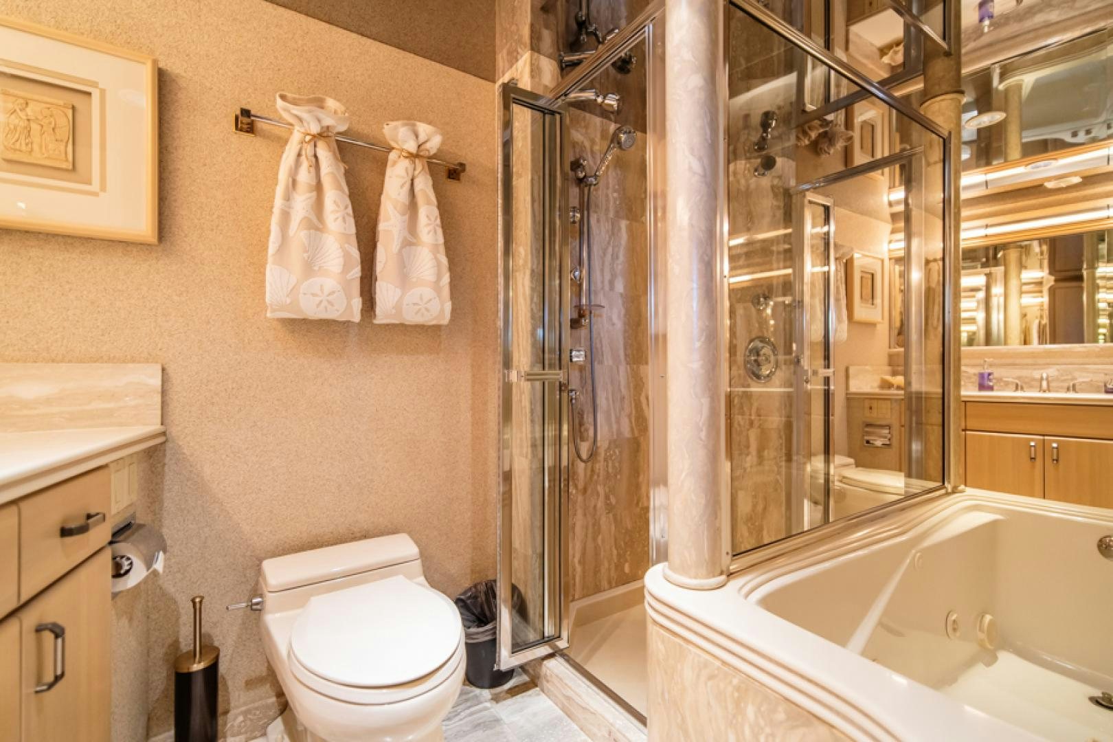 a bathroom with a shower and toilet aboard NO EXCEPTIONS Yacht for Sale
