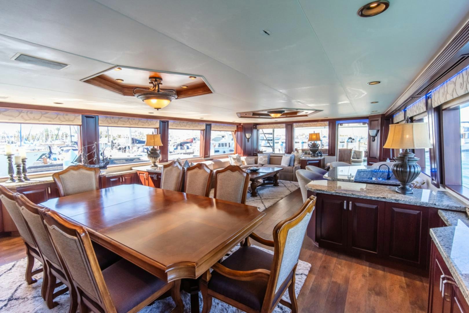 a large dining room with a large table and chairs aboard NO EXCEPTIONS Yacht for Sale