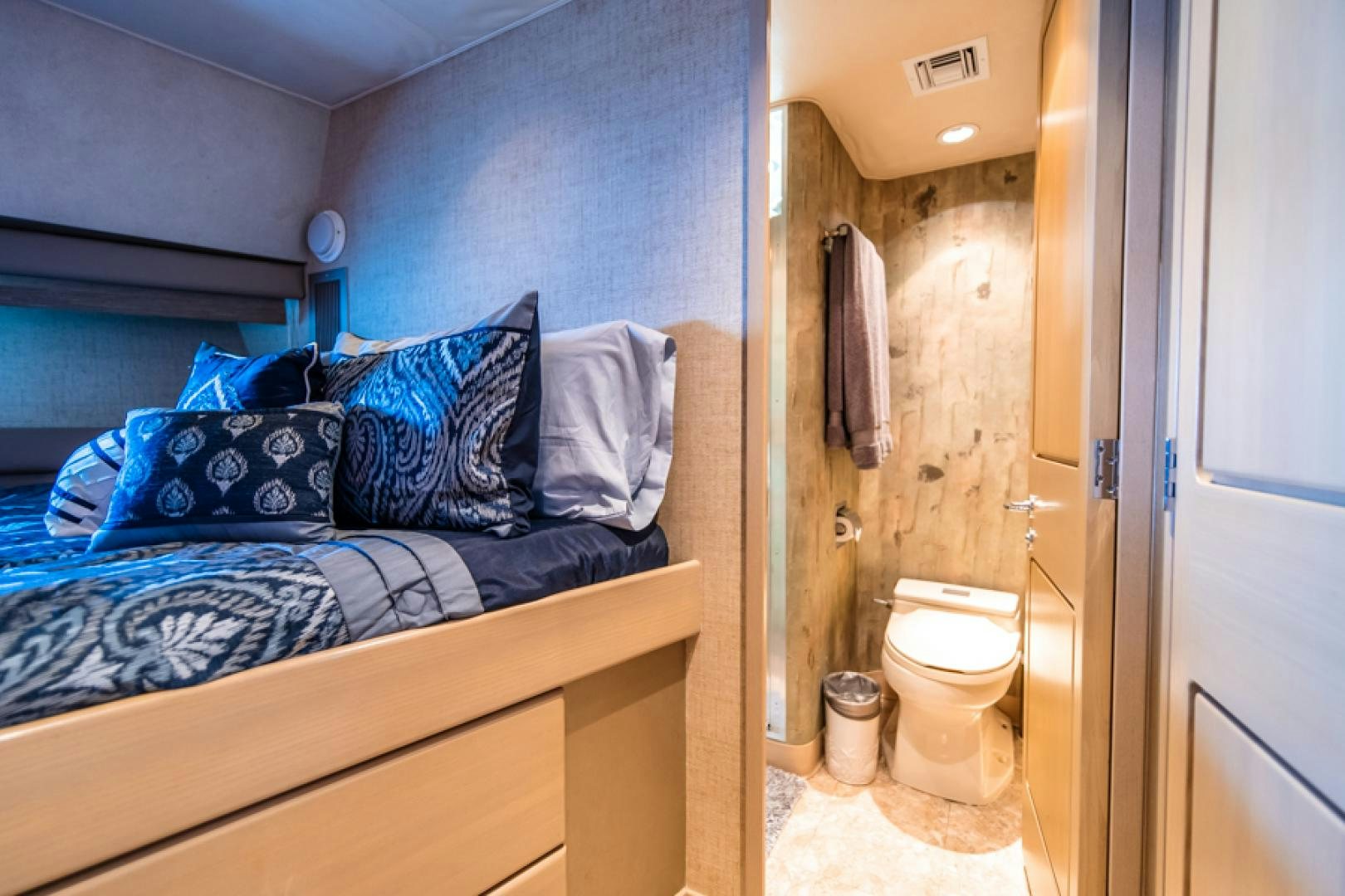 a bed in a room aboard NO EXCEPTIONS Yacht for Sale