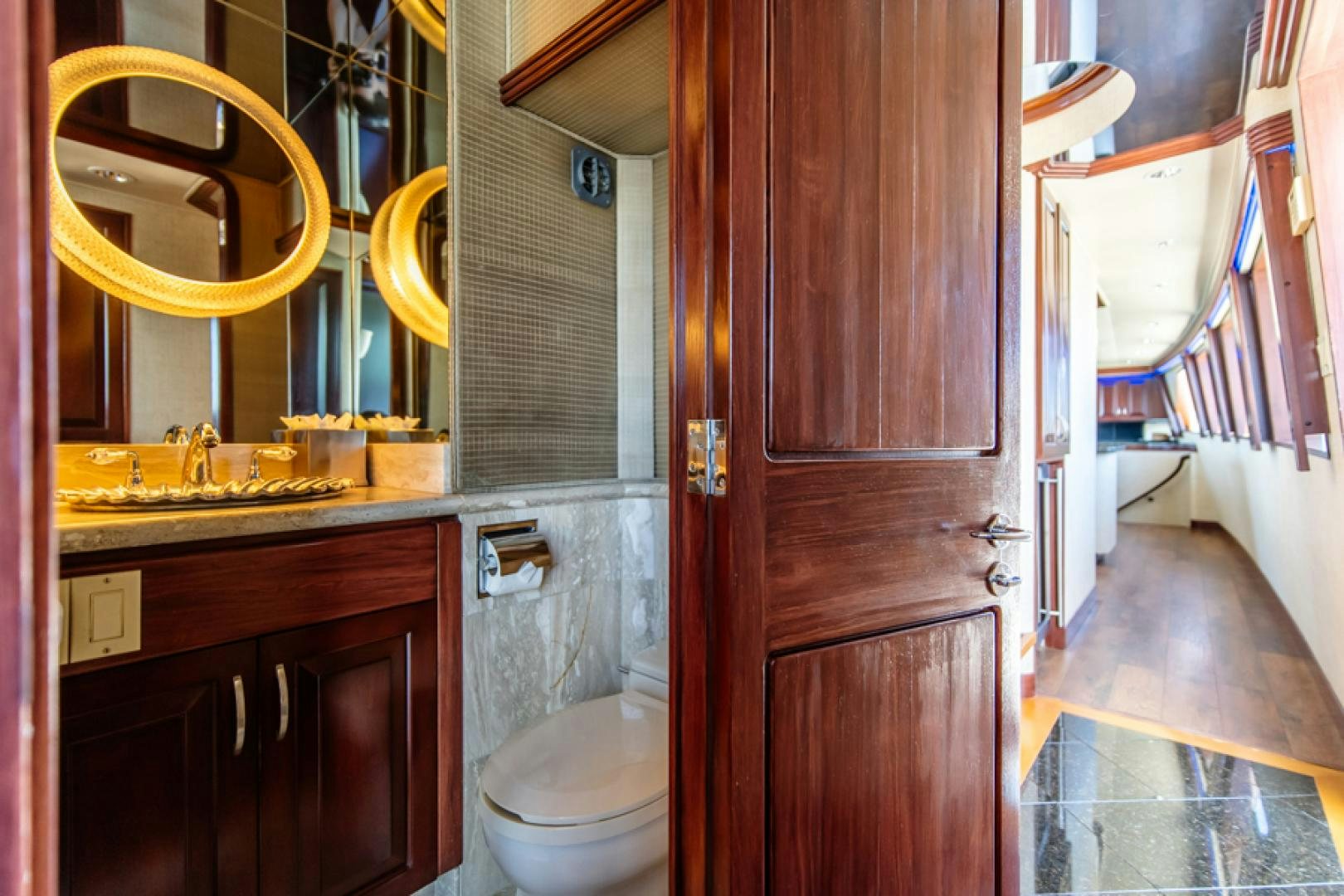 a bathroom with a sink and toilet aboard NO EXCEPTIONS Yacht for Sale