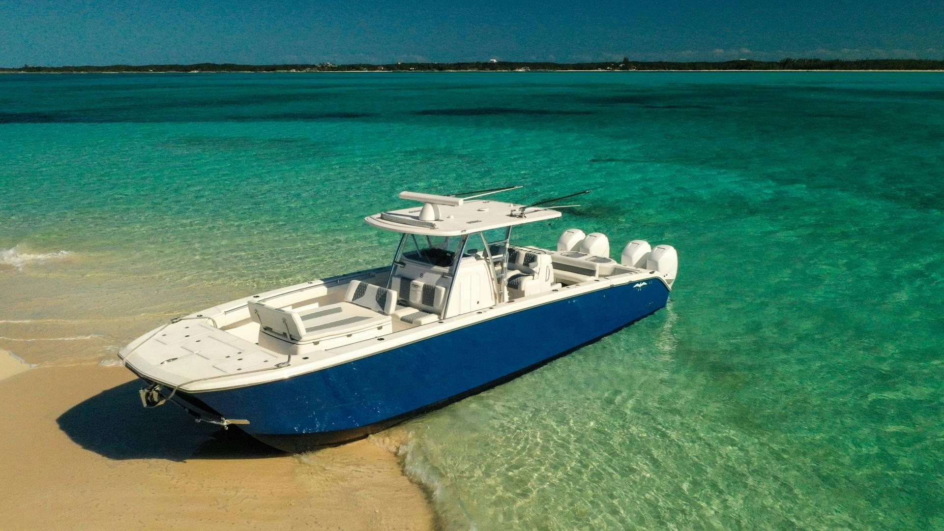 a boat on the beach aboard 8 PACK Yacht for Sale