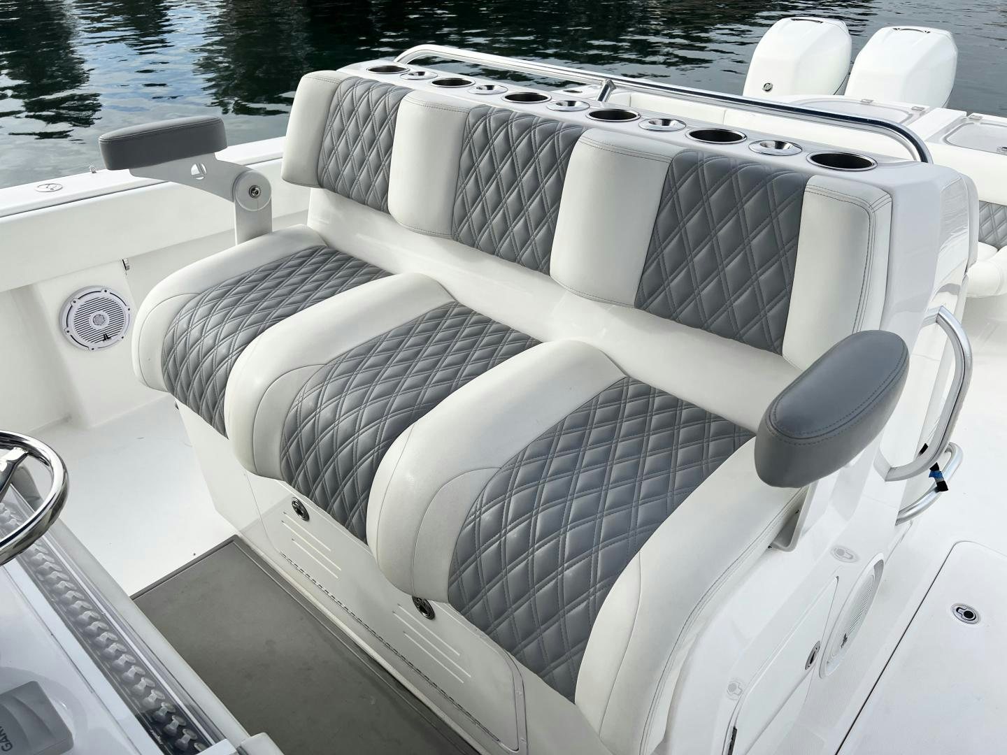 a white car with a large hood aboard 8 PACK Yacht for Sale