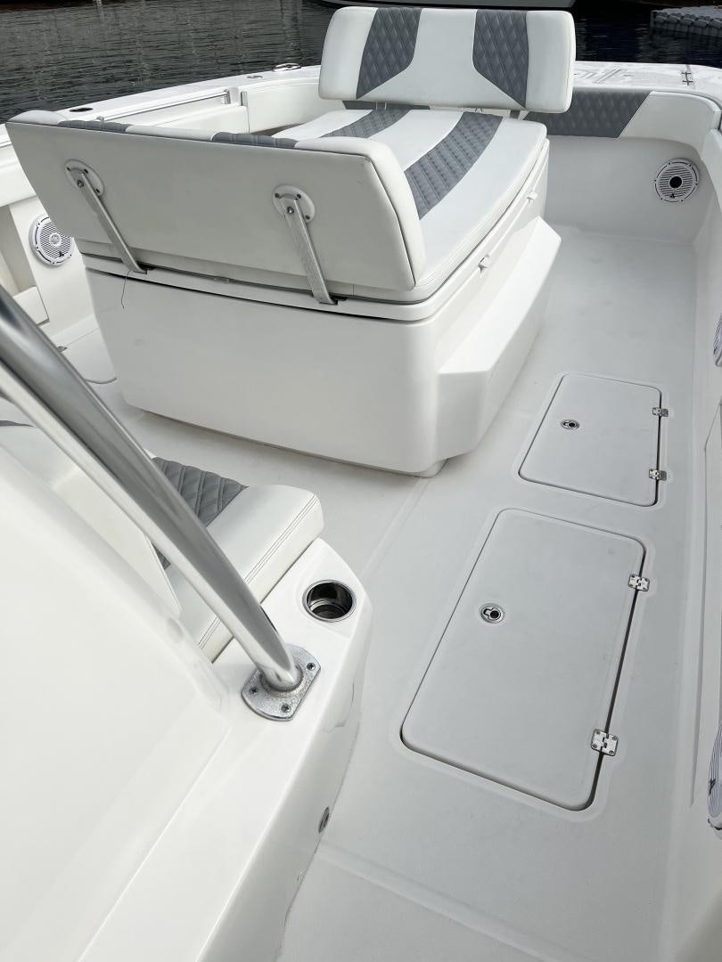 a white sink with a faucet aboard 8 PACK Yacht for Sale