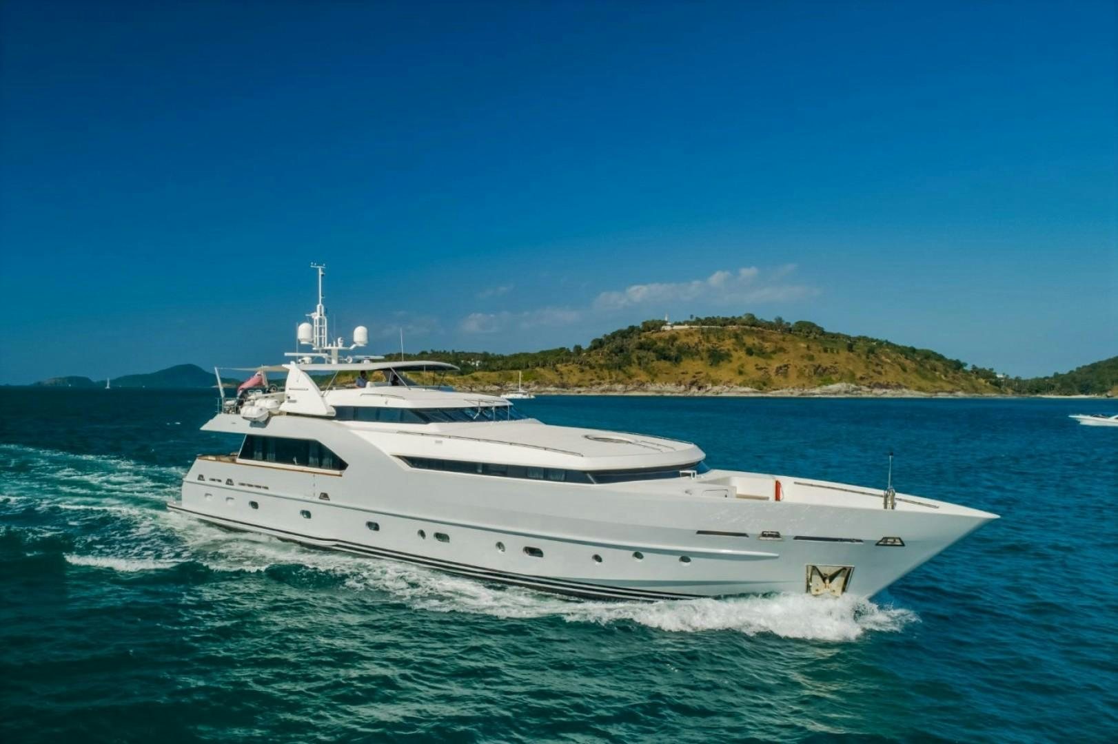 a white yacht on the water aboard XANADU OF LONDON Yacht for Sale