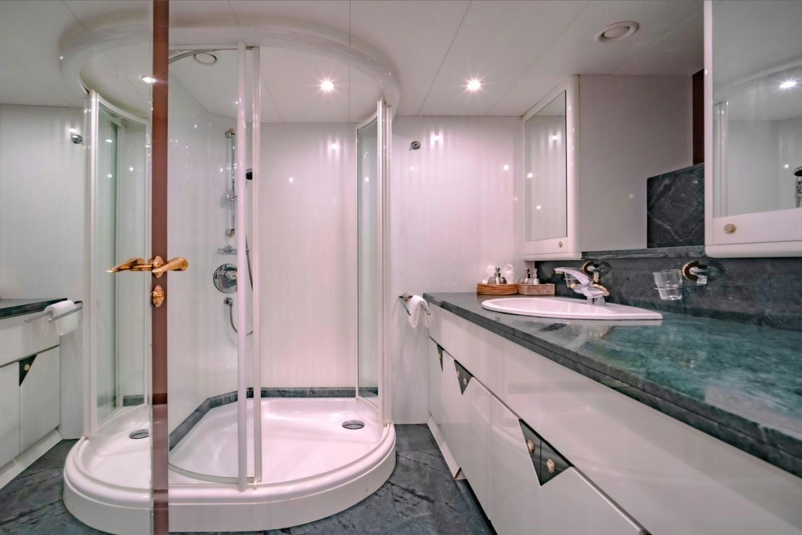 a bathroom with a large shower aboard XANADU OF LONDON Yacht for Sale