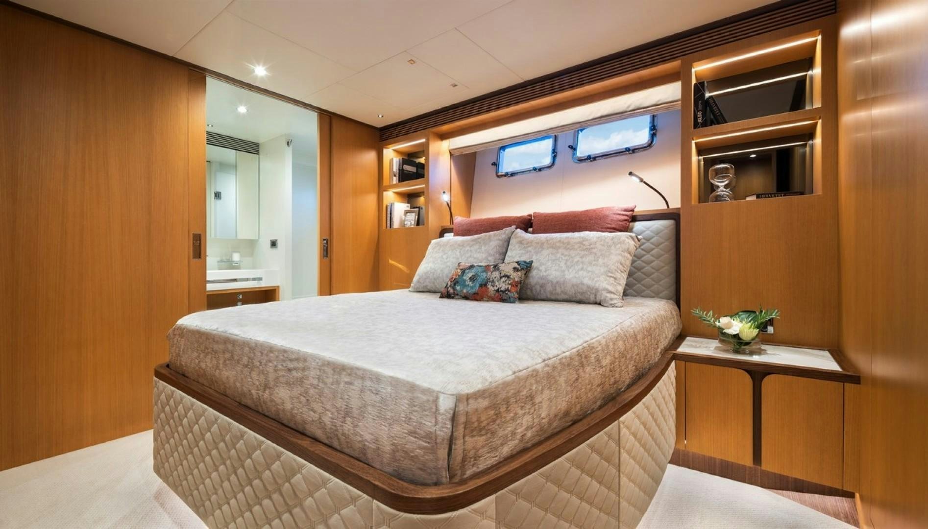 a bed in a room aboard PARABOLIC Yacht for Sale