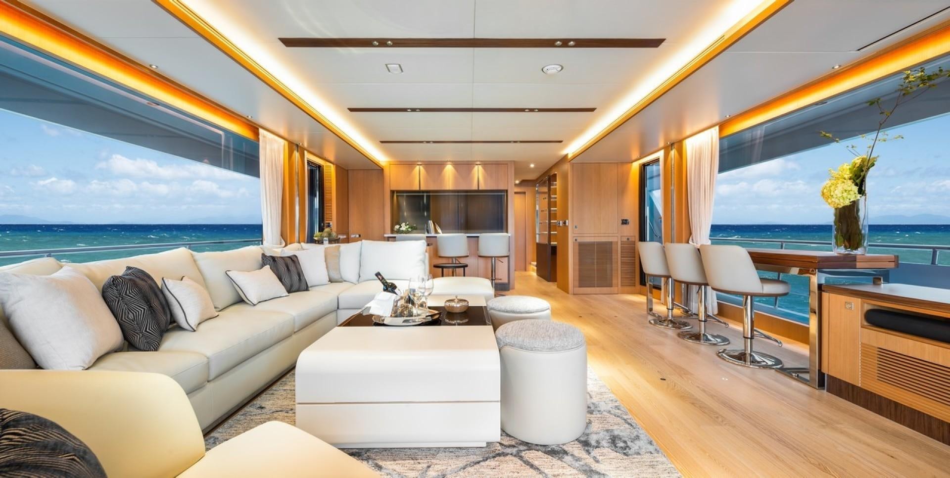 a room with a large window and a large bed aboard PARABOLIC Yacht for Sale