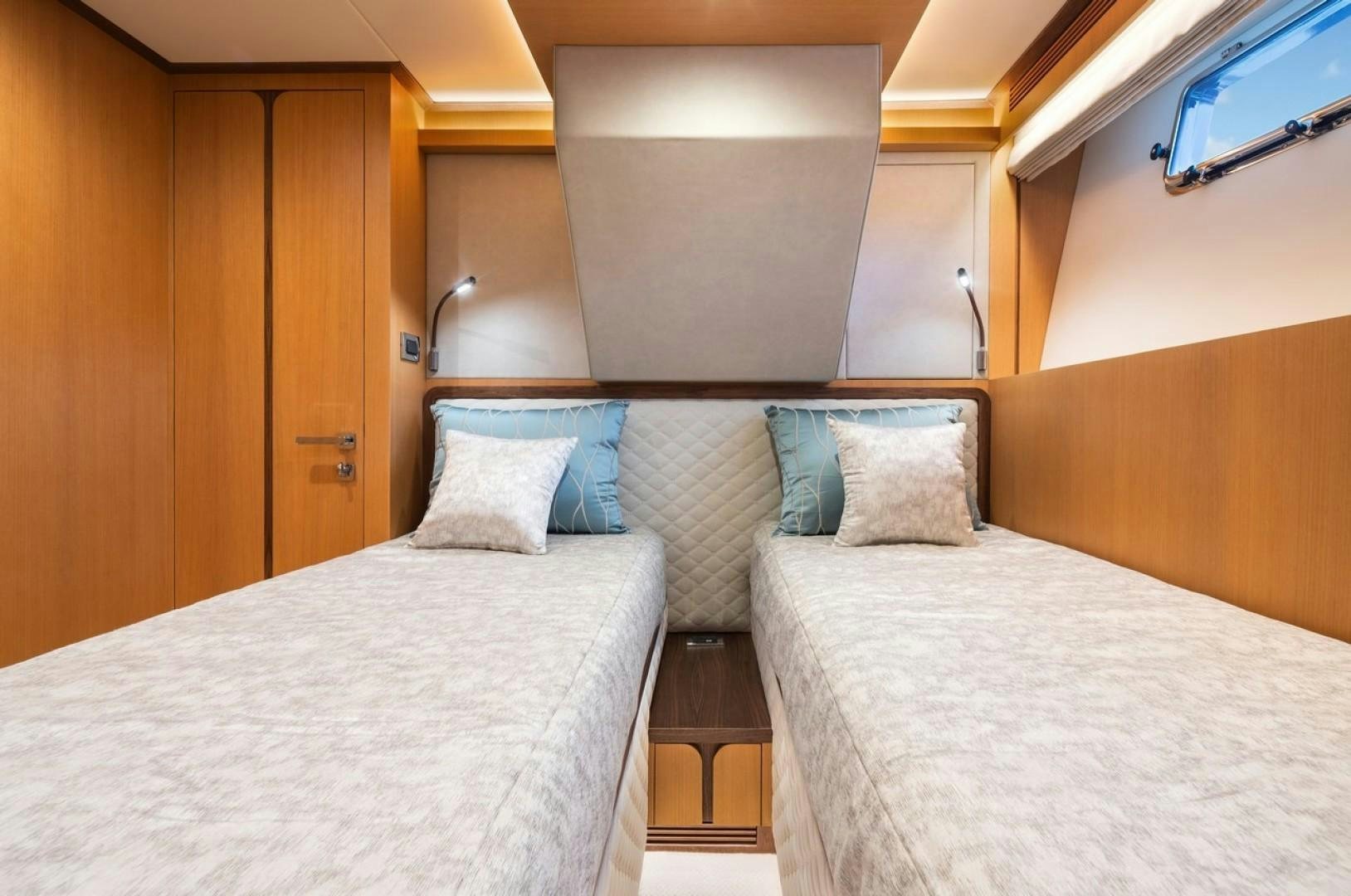a couple of beds in a room aboard PARABOLIC Yacht for Sale