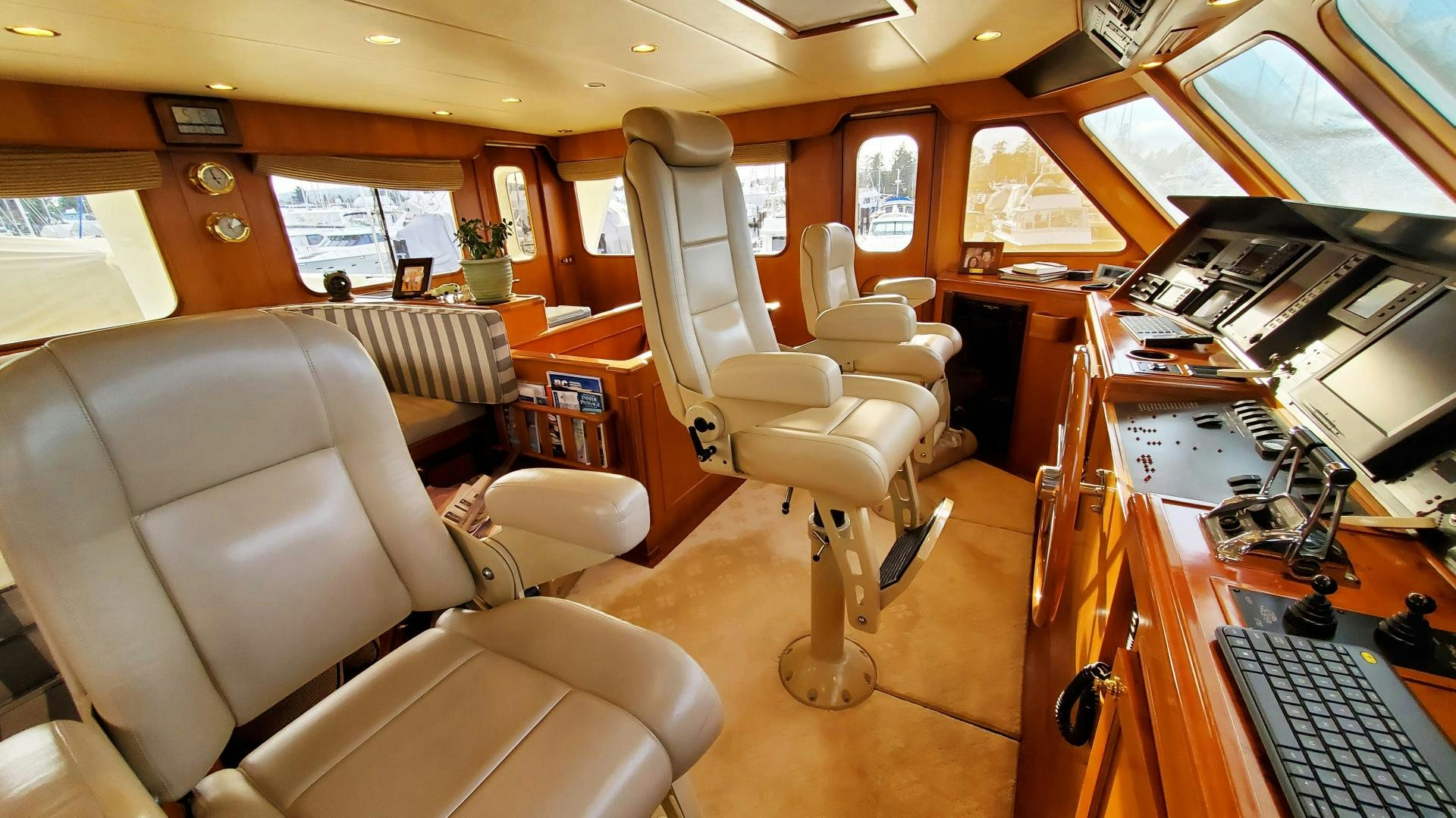 a room with a desk and chairs aboard ANTARES Yacht for Sale