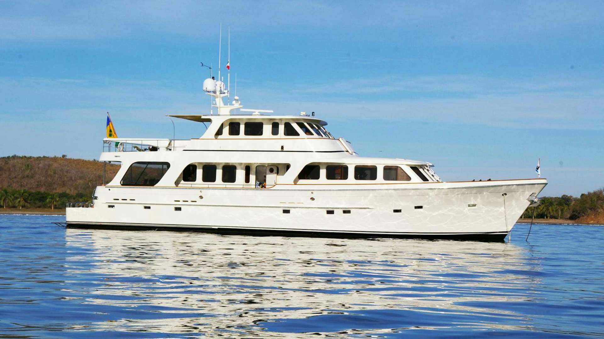 a white boat on water aboard ANTARES Yacht for Sale