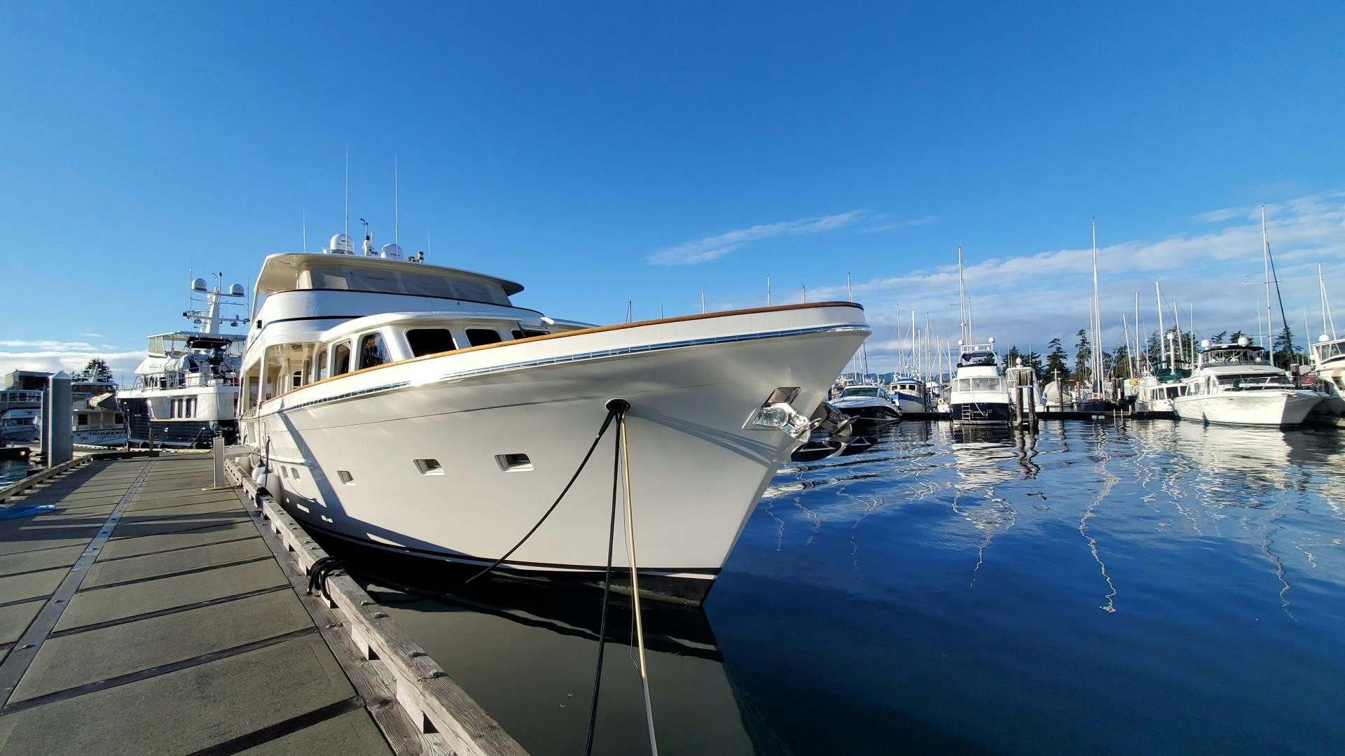 a boat docked at a pier aboard ANTARES Yacht for Sale