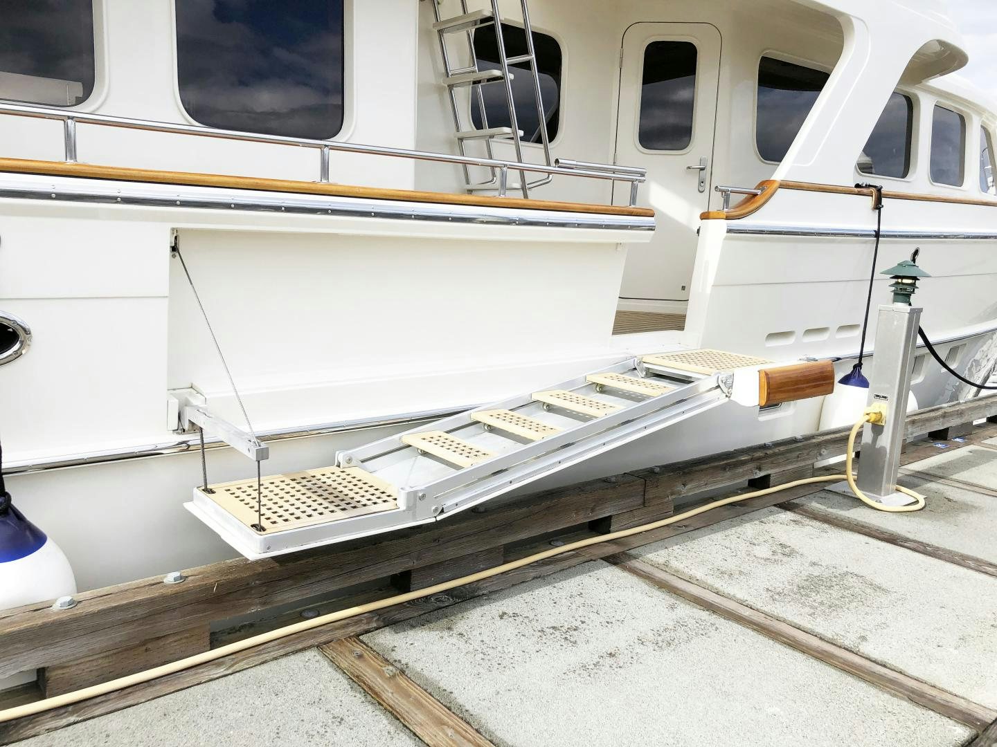 a white boat on a trailer aboard ANTARES Yacht for Sale