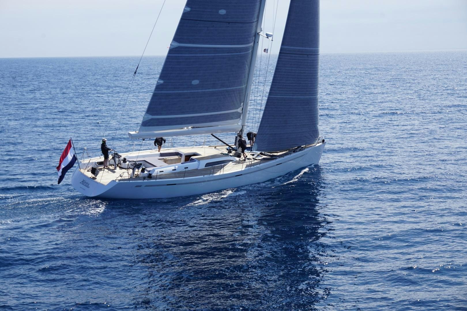 a boat sailing on the sea aboard XERES Yacht for Sale