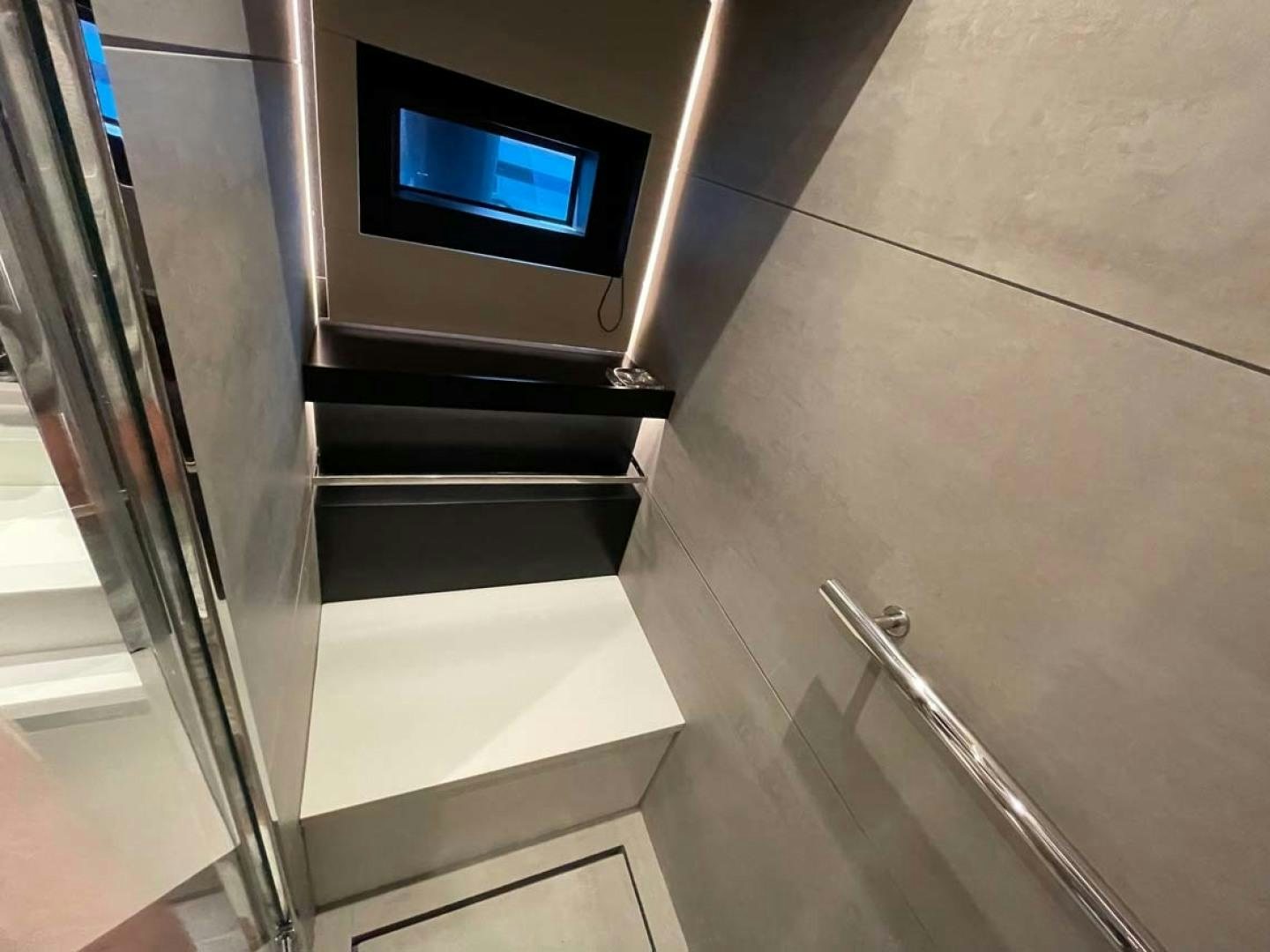 a tv on a wall aboard LAS BRISAS Yacht for Sale