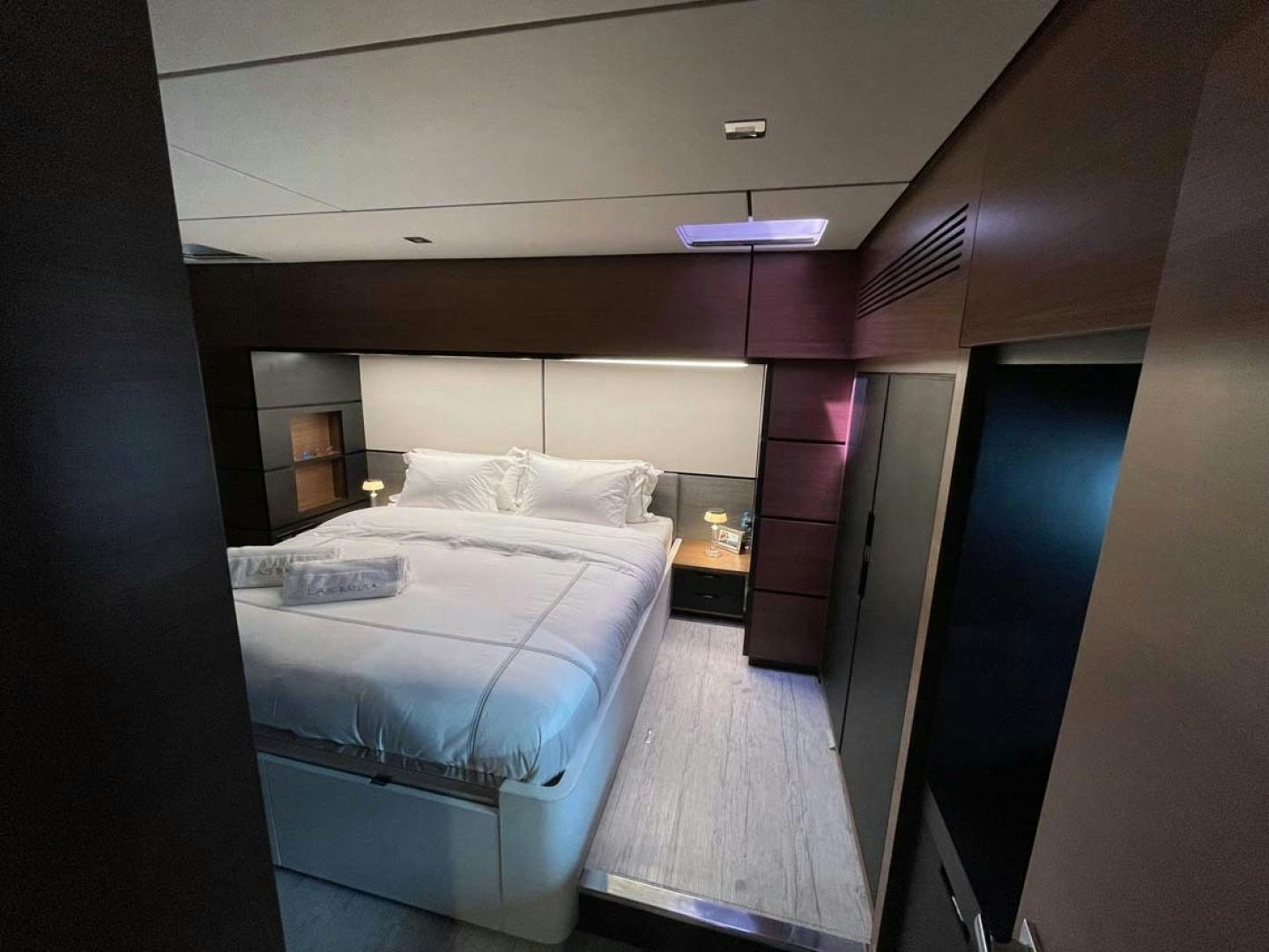 a bedroom with a bed aboard LAS BRISAS Yacht for Sale