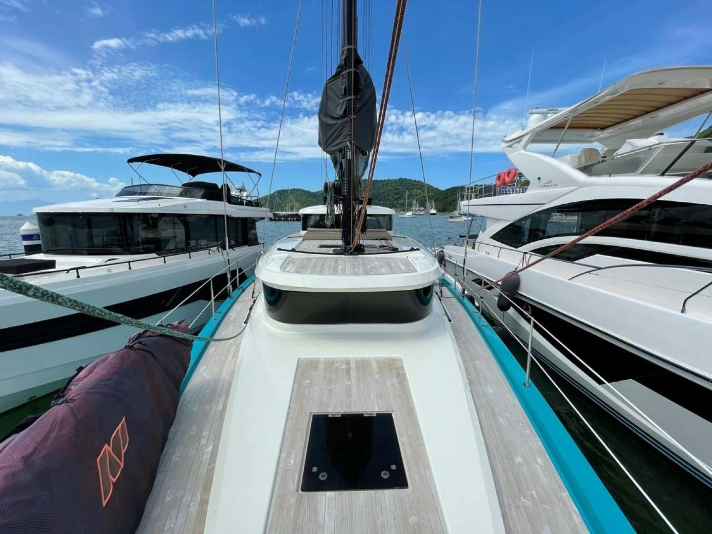 a group of boats are parked in a harbor aboard LAS BRISAS Yacht for Sale