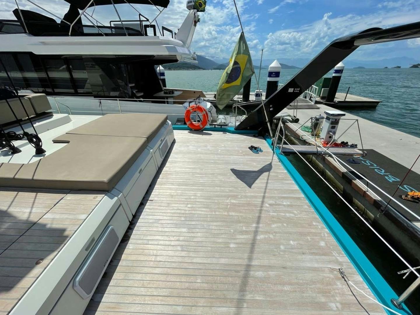 a wooden dock with a plane on it aboard LAS BRISAS Yacht for Sale