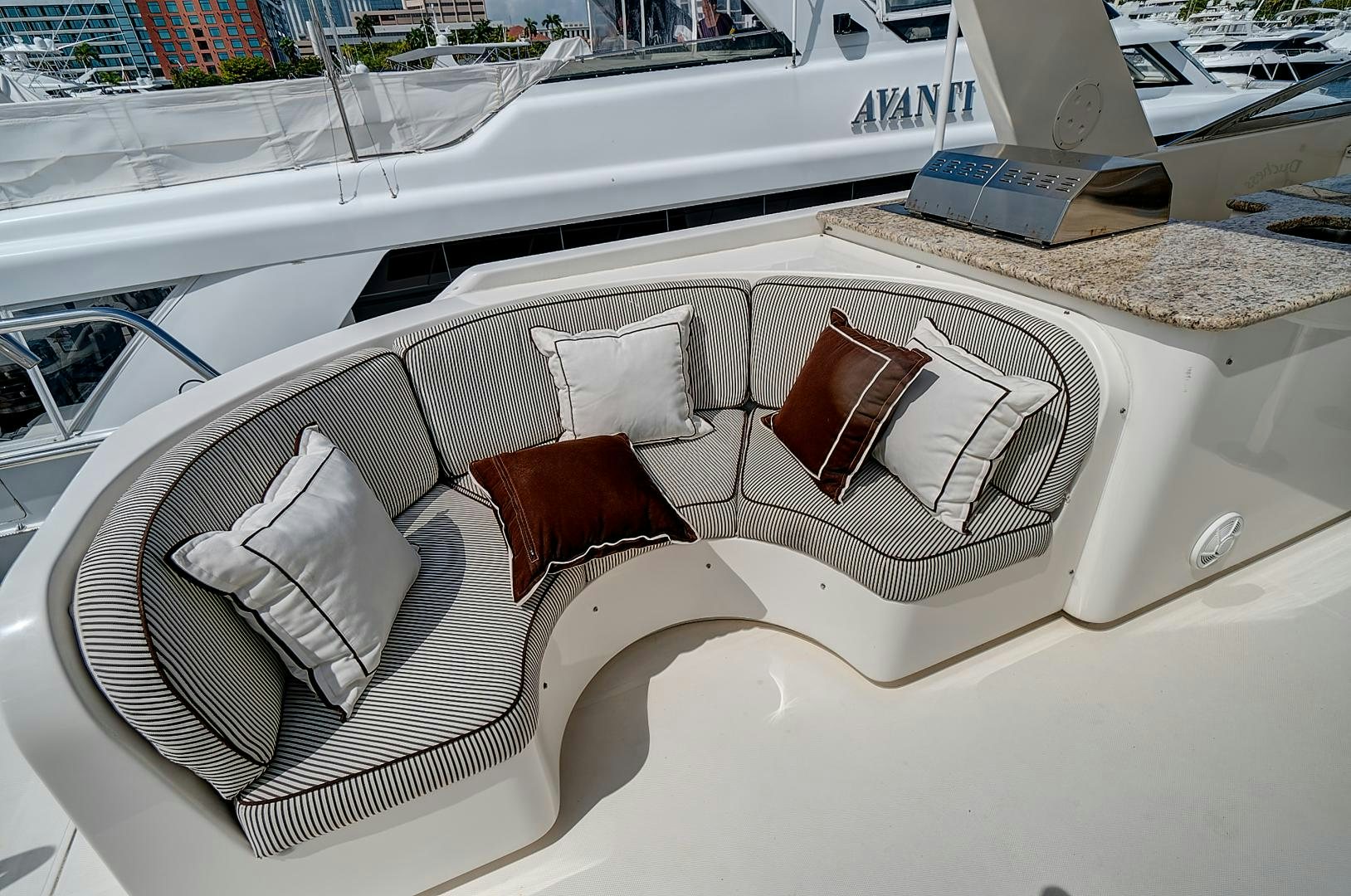 a white car with a red seat aboard LADY B Yacht for Sale