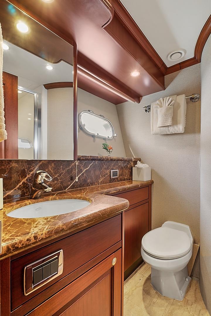 a bathroom with a sink and toilet aboard LADY B Yacht for Sale