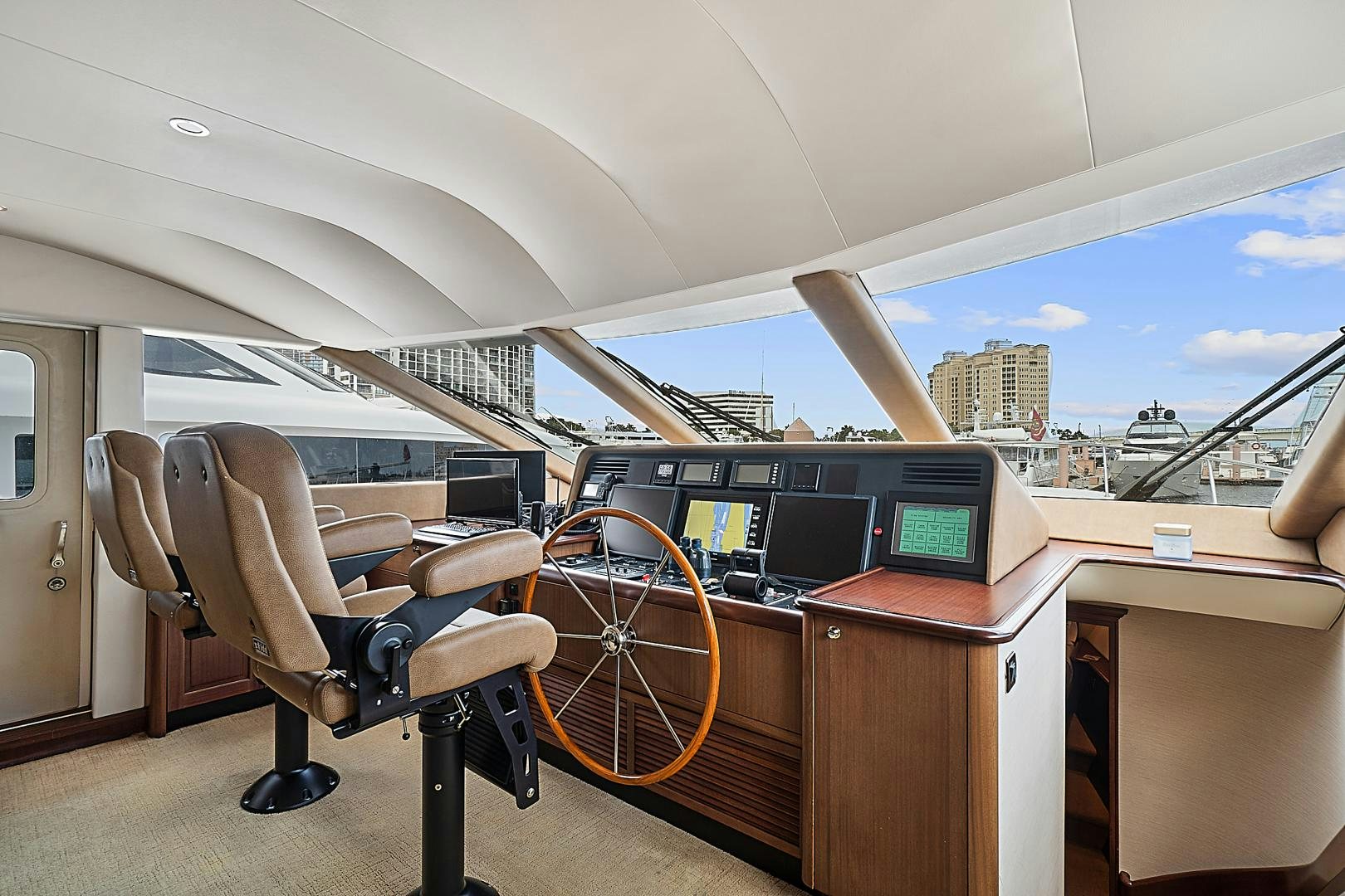 a chair and desk in a car aboard LADY B Yacht for Sale