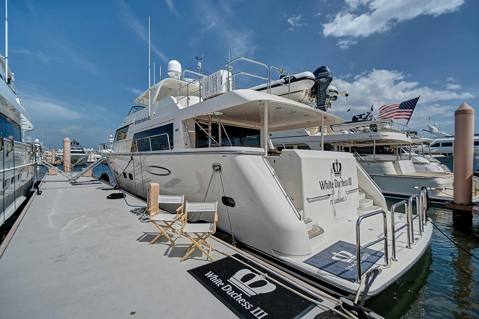a boat docked at a pier aboard LADY B Yacht for Sale