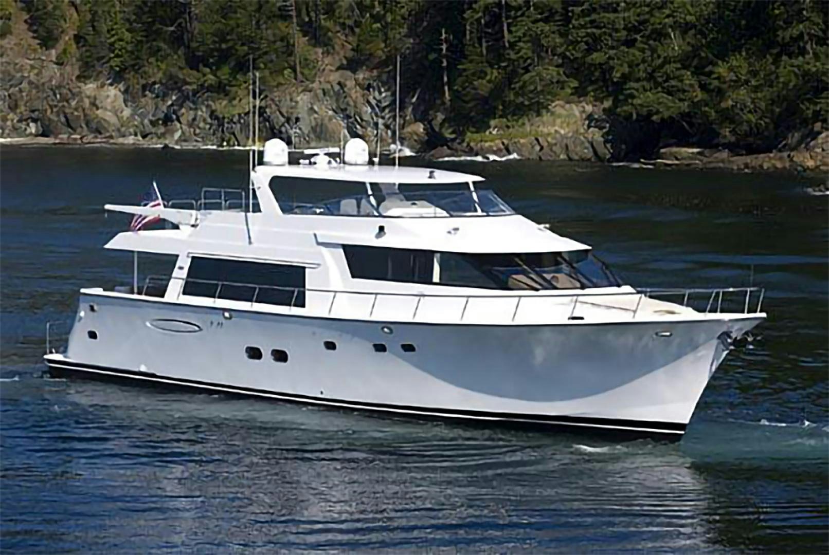a white yacht on the water aboard LADY B Yacht for Sale