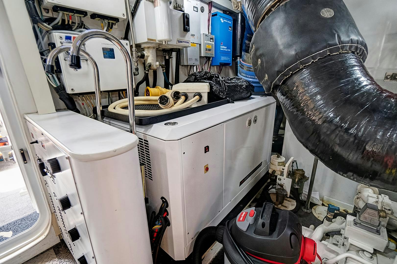 a large machine with a large metal cylinder aboard LADY B Yacht for Sale