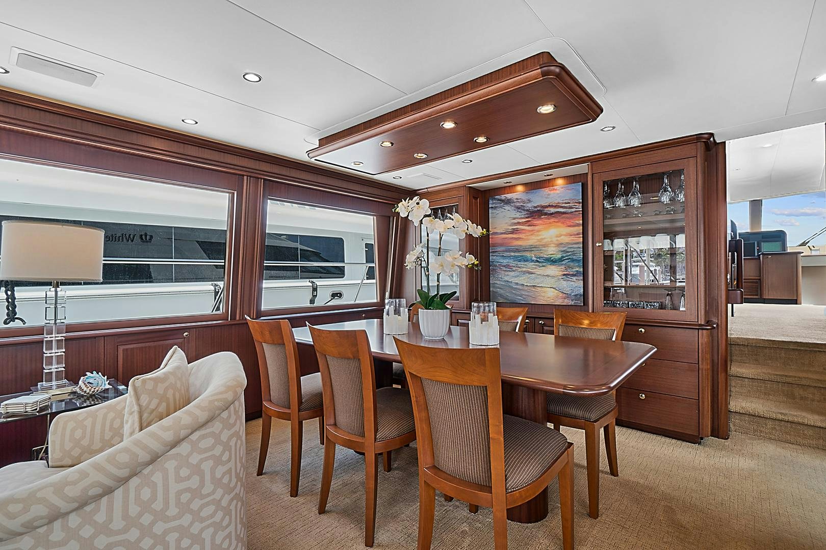a dining table in a room aboard LADY B Yacht for Sale