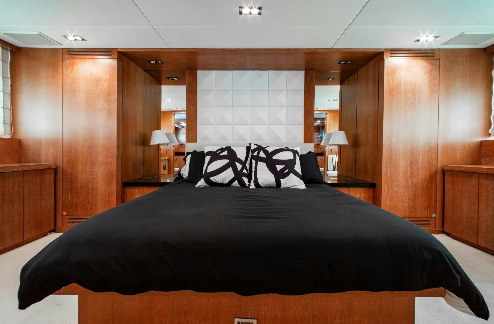 a bed in a room aboard SMILE Yacht for Charter