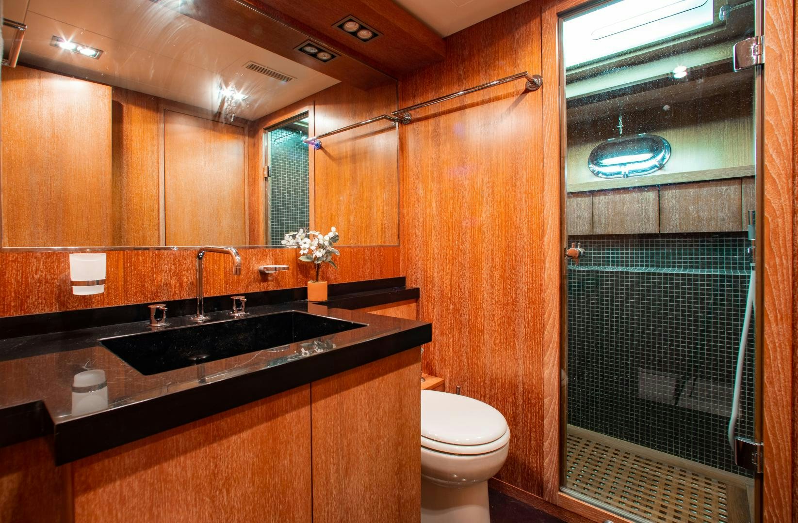 a bathroom with a sink and a toilet aboard SMILE Yacht for Sale