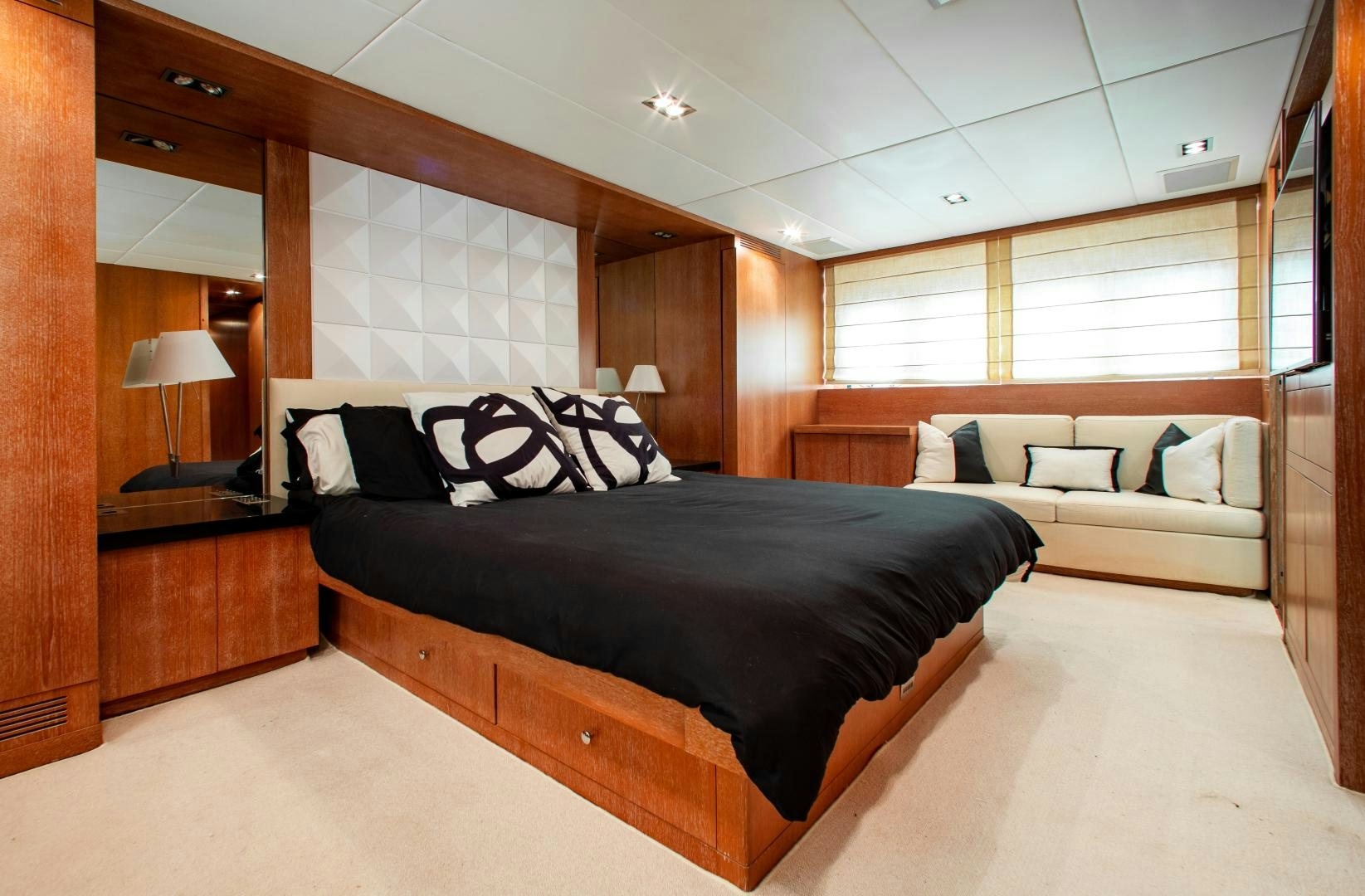 a bed in a room aboard SMILE Yacht for Charter