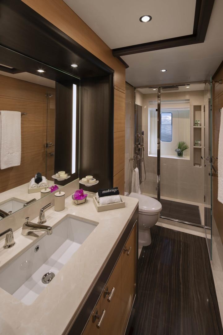 a bathroom with a sink and a shower aboard JODI ANN Yacht for Sale