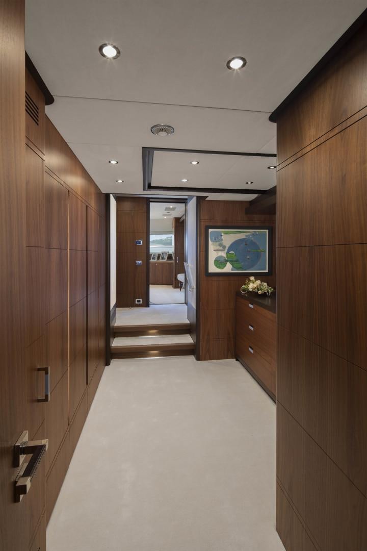 a hallway with wood cabinets aboard JODI ANN Yacht for Sale