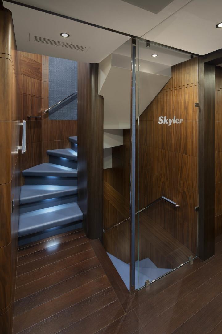 a wood cabinet in a room aboard JODI ANN Yacht for Sale