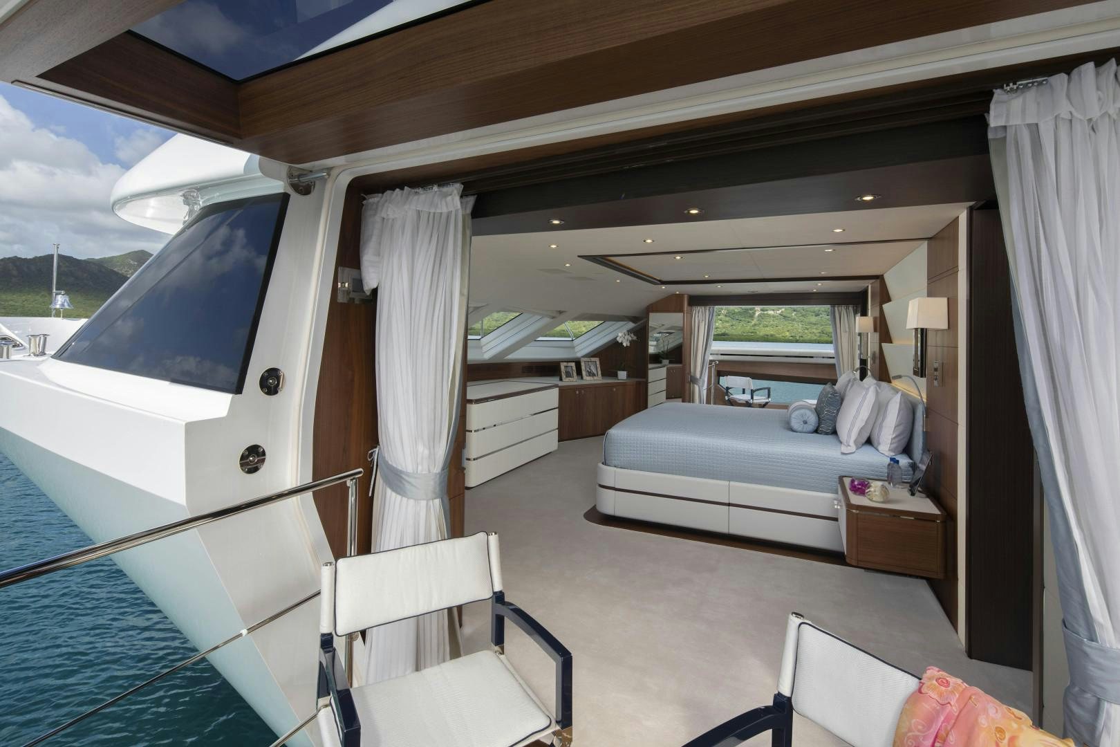 a room with a bed and a couch aboard JODI ANN Yacht for Sale