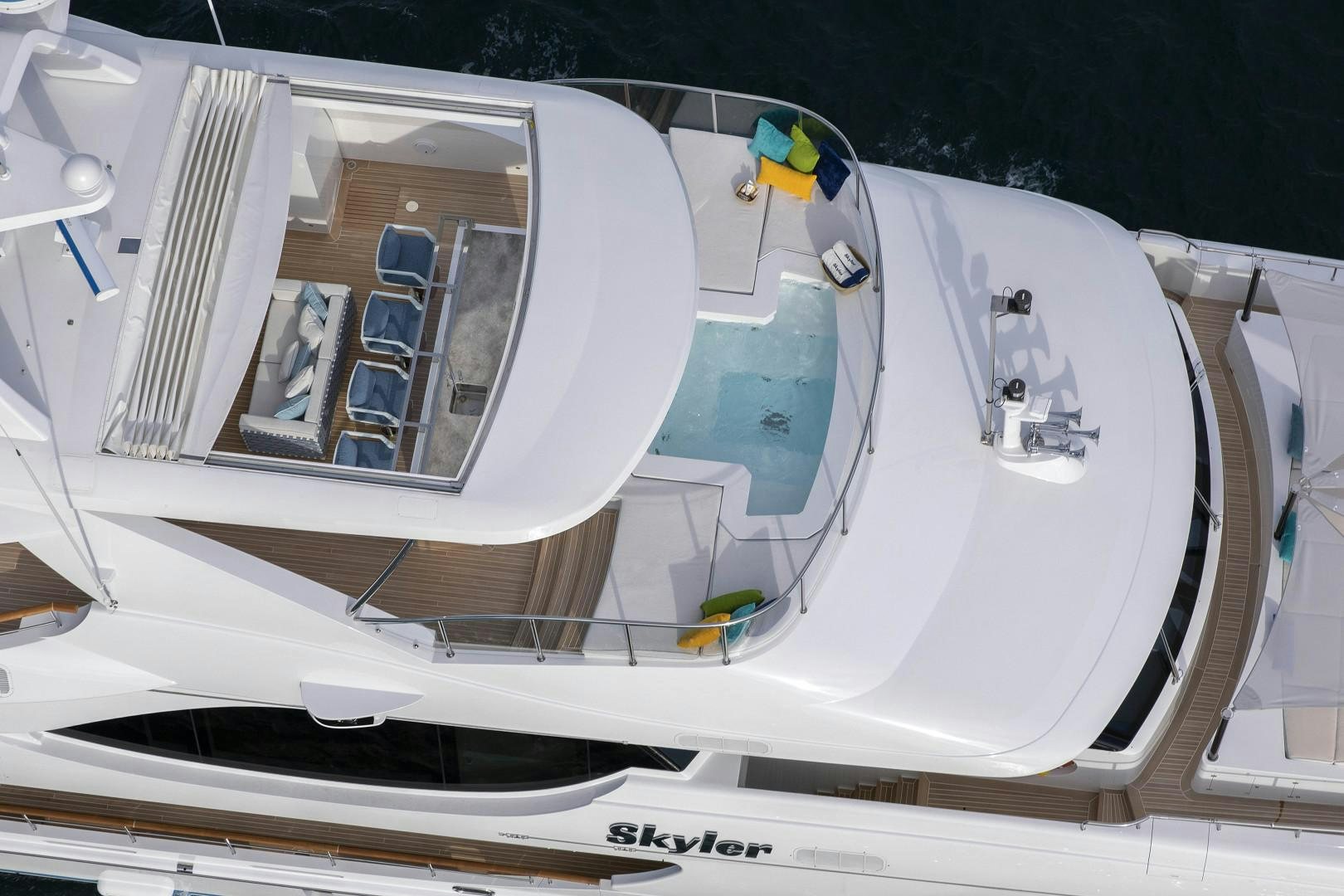 a white boat with a white sail aboard JODI ANN Yacht for Sale