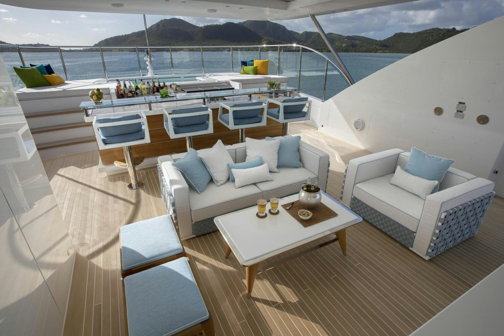 a room with a couch and a table and chairs aboard JODI ANN Yacht for Sale