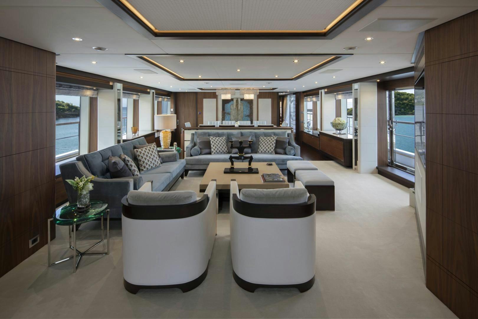 a living room with a couch and a coffee table aboard JODI ANN Yacht for Sale