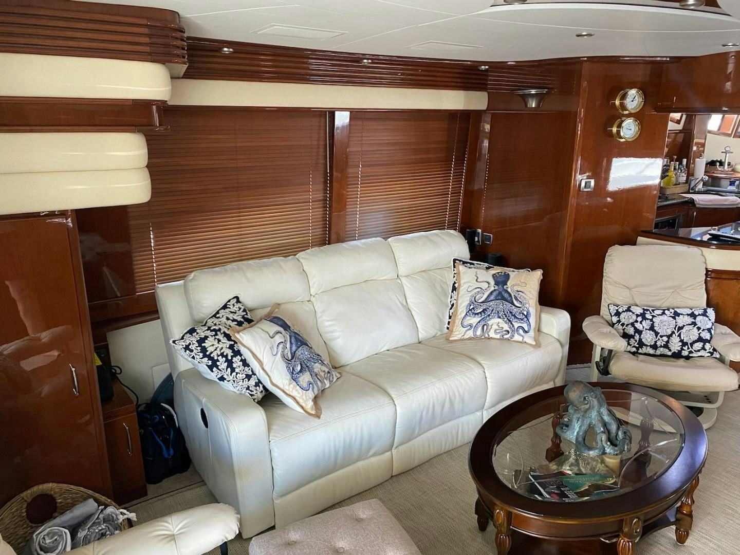 a living room with a couch and a coffee table aboard Gettin' There Yacht for Sale