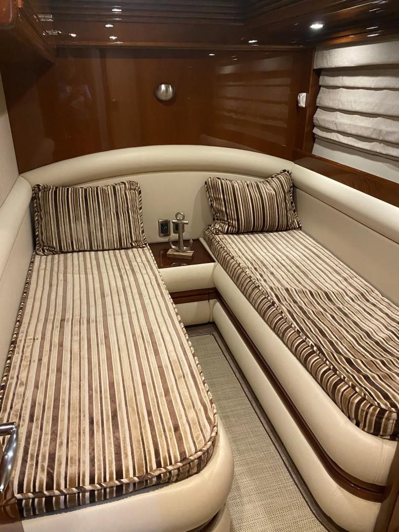 a couple of beds in a room aboard Gettin' There Yacht for Sale