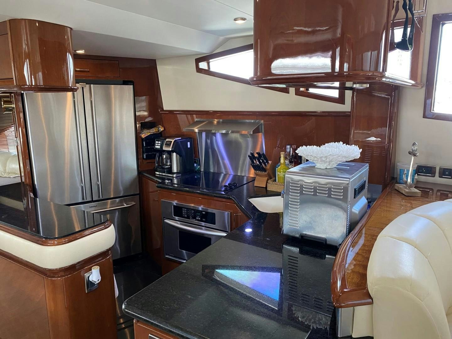 a kitchen with a stainless steel stove aboard Gettin' There Yacht for Sale