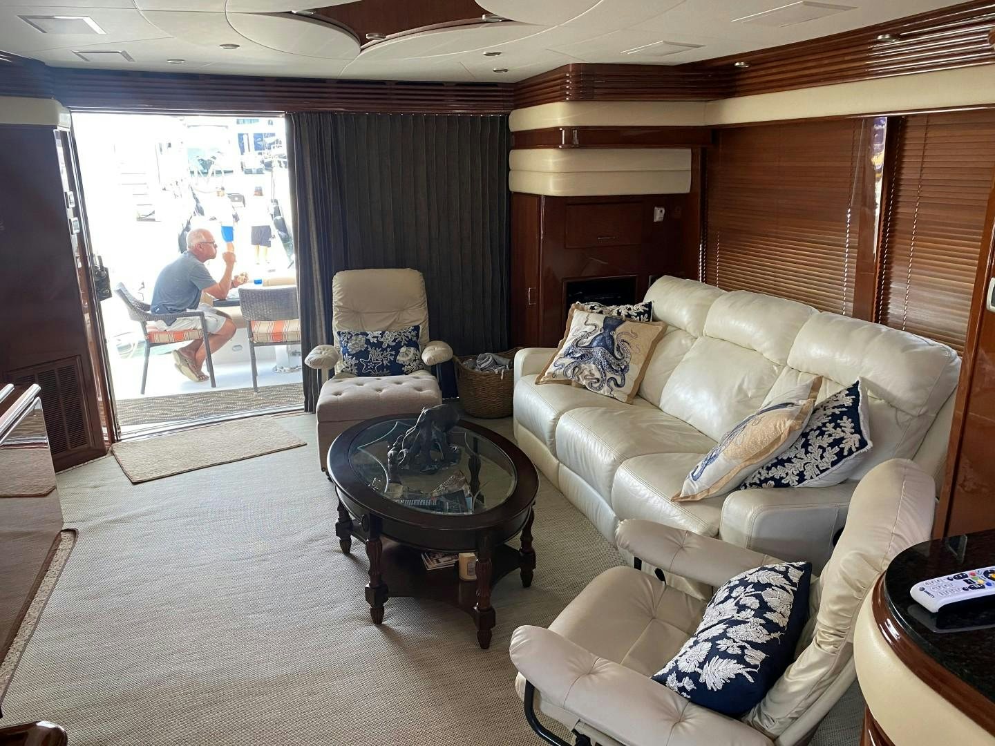 a person sitting on a couch in a cabin aboard Gettin' There Yacht for Sale