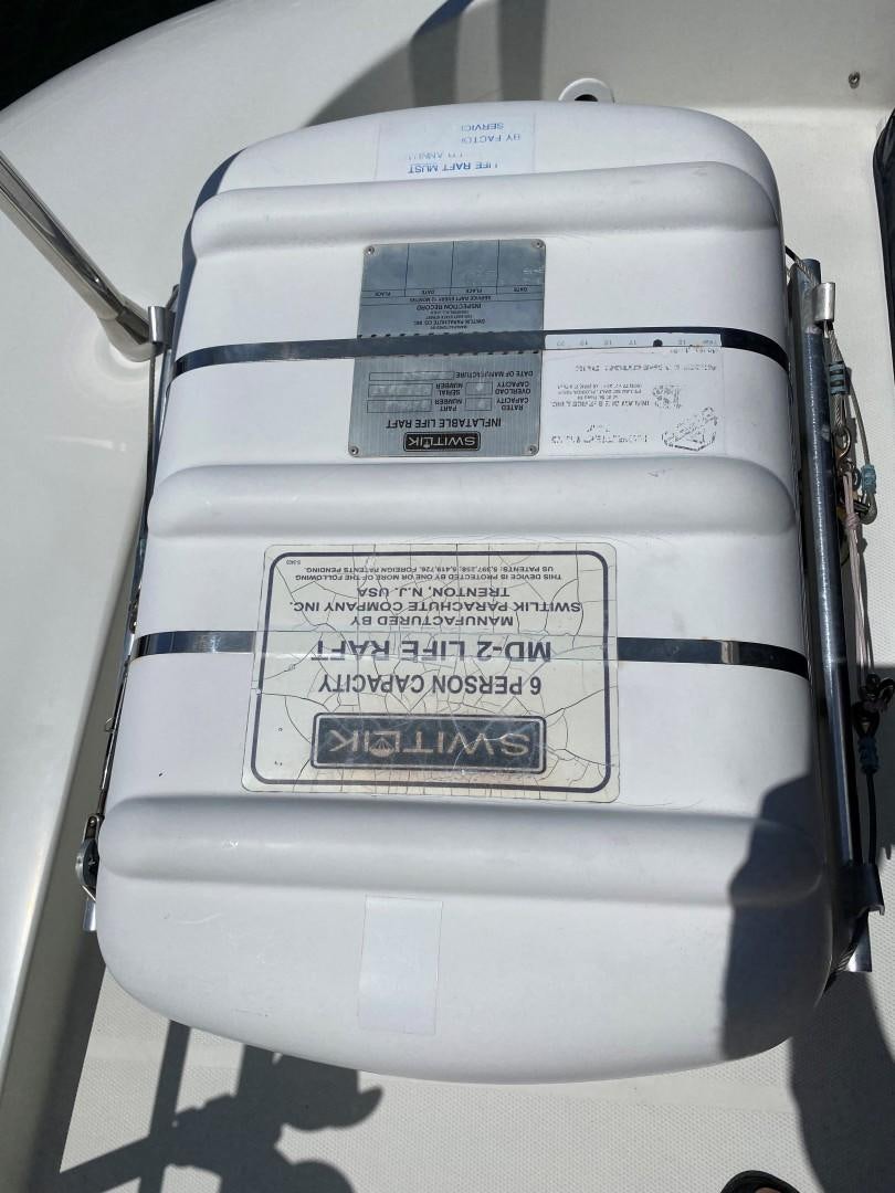 a white plastic container with a label aboard Gettin' There Yacht for Sale